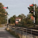 Boughton Signal Box with both starter signal poles in place. The pole on the right is the platform starter signal whilst the one on the left is the starter for the loop. Photo: N&LR Collection