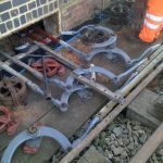 Cranks for lever 13 & 14 installed. Note the triple pulley with the chain on the top wheel that is now connected to Signal BG4. The bricked up lead out box reduces draughts for the signaller. The use of water pipe as a chain/wire conduit reduces the draughts and the chance of animals entering the box.