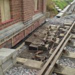 2009, the initial laying out of the external crank bench. Note only the concrete foundation castings are in place, the hardwood timber was purchased & installed later. The cranks shown have been refurbished & repainted prior to final installation.