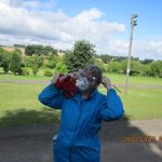 On 29th July 2015 a volunteer from Nationwide Building Society masks up prior to cleaning the (rail) road dirt of a BR B5 Bogie in preparation for it to be installed under one of the Mark 2 coaches at the railway. Photo: Grahame Every