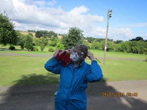 On 29th July 2015 a volunteer from Nationwide Building Society masks up prior to cleaning the (rail) road dirt of a BR B5 Bogie in preparation for it to be installed under one of the Mark 2 coaches at the railway. Photo: Grahame Every