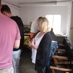 Volunteers sort, identify the size & thread type of track nuts & bolts, before wire brushing them prior to cleaning the threads with a die or tap on 15th July 2015.