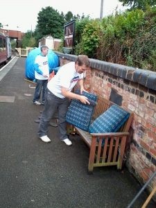 Coach seat cushions are cleaned by Nationwide Building Society volunteers. Photo: David Millard