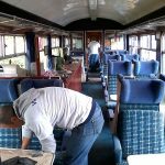 Nationwide Building Society volunteers cleaning the Bar coach ready for an event weekend. Photo: David Millard