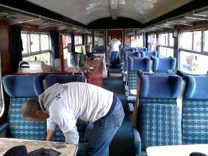 Nationwide Building Society volunteers cleaning the Bar coach ready for an event weekend. Photo: David Millard