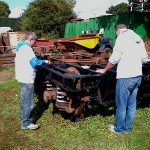 Nationwide Building Society volunteers painting a second bogie, to get it ready for the N&LR engineers to install it under one of the coaches. Photo: David Millard