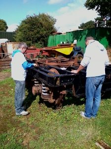 Nationwide Building Society volunteers painting a second bogie, to get it ready for the N&LR engineers to install it under one of the coaches. Photo: David Millard