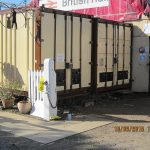 After the container door repainting. Paint colours used in the transformation are BS381C Biscuit and Mid Brown, along with recently donated black Aldi Metalcare paint. Photo: Grahame Every