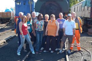 The 10th Sept 2015 group of Nationwide Building Society volunteers (Helen, Vicky, John, Peta, Carol, Liz, Paul and Rob) with Volunteer Coordinator Grahame Every and Volunteer Working Member David Millard in Orange Hi-Viz. Photo: B.Chambers