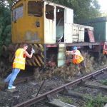 Nationwide Building Society volunteers thought that the fishplate task wasn't enough exercise, so Helen, Rob and Paul did some competitive team building..... only to find out that the hand brake was on!. Note: no rail movements were undertaken during the Give and Gain day and railway volunteers were present at all times. Photo: D.Millard
