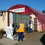 Volunteer Coordinator Grahame Every and Nationwide Building Society volunteers, Carol, Lis, Peta and John start to paint the container ends with BS381C Biscuit and Mid brown. Photo: D.Millard