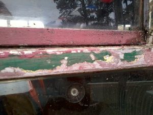A close up of one of the window bars of BR Mk 1 TSO Coach S3919. This view shoes that the coach was painted in Crimson & Cream prior to being repainted into BR Southern Region green. Photo: D.Millard