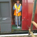 Volunteer Co-ordinator Grahame Every does as Santa has asked and mops the floor of the Grotto
