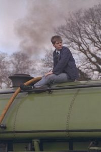 Antony Philip fills the water tank of Peckett 2104